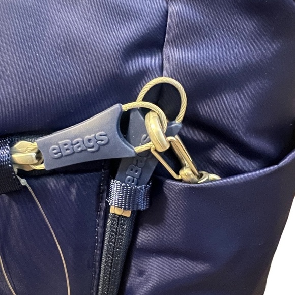 NWT Pacsafe City safe Cx Crossbody Blue Anti Theft Crossbody Moonshape Bag - Picture 9 of 16